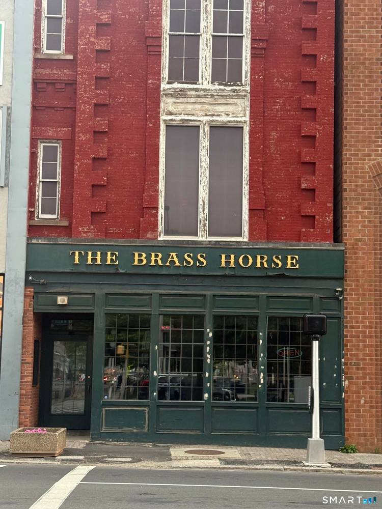 Positioned in the heart of Downtown Waterbury's thriving business and entertainment district, this iconic four story commercial landmark presents a rare opportunity to acquire one of the city's most recognizable ...