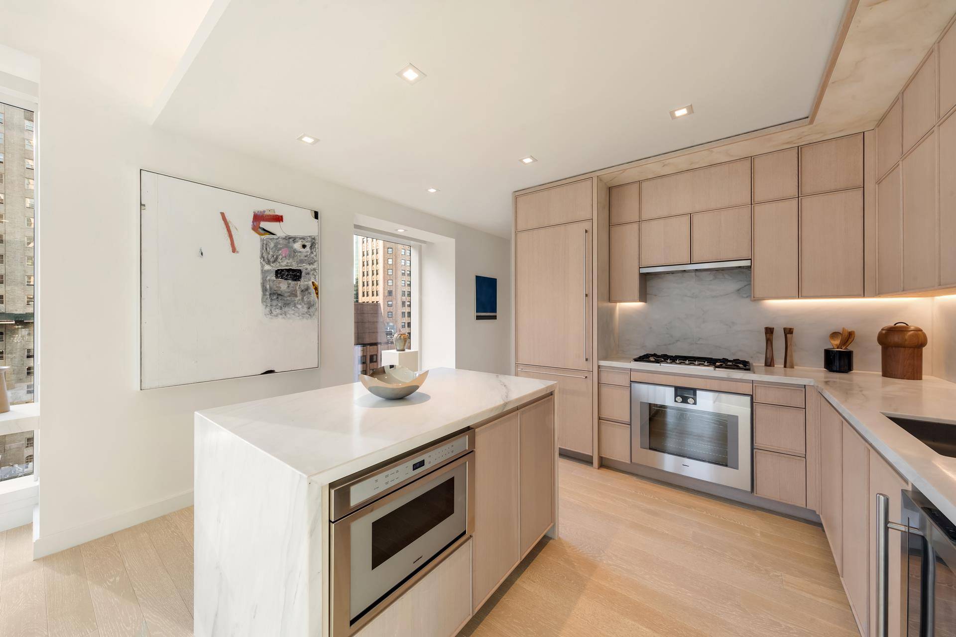 Immediate Occupancy. This expansive one bedroom, one and a half bathroom residence designed by Champalimaud offers northern, western, and southern exposures through floor to ceiling windows.