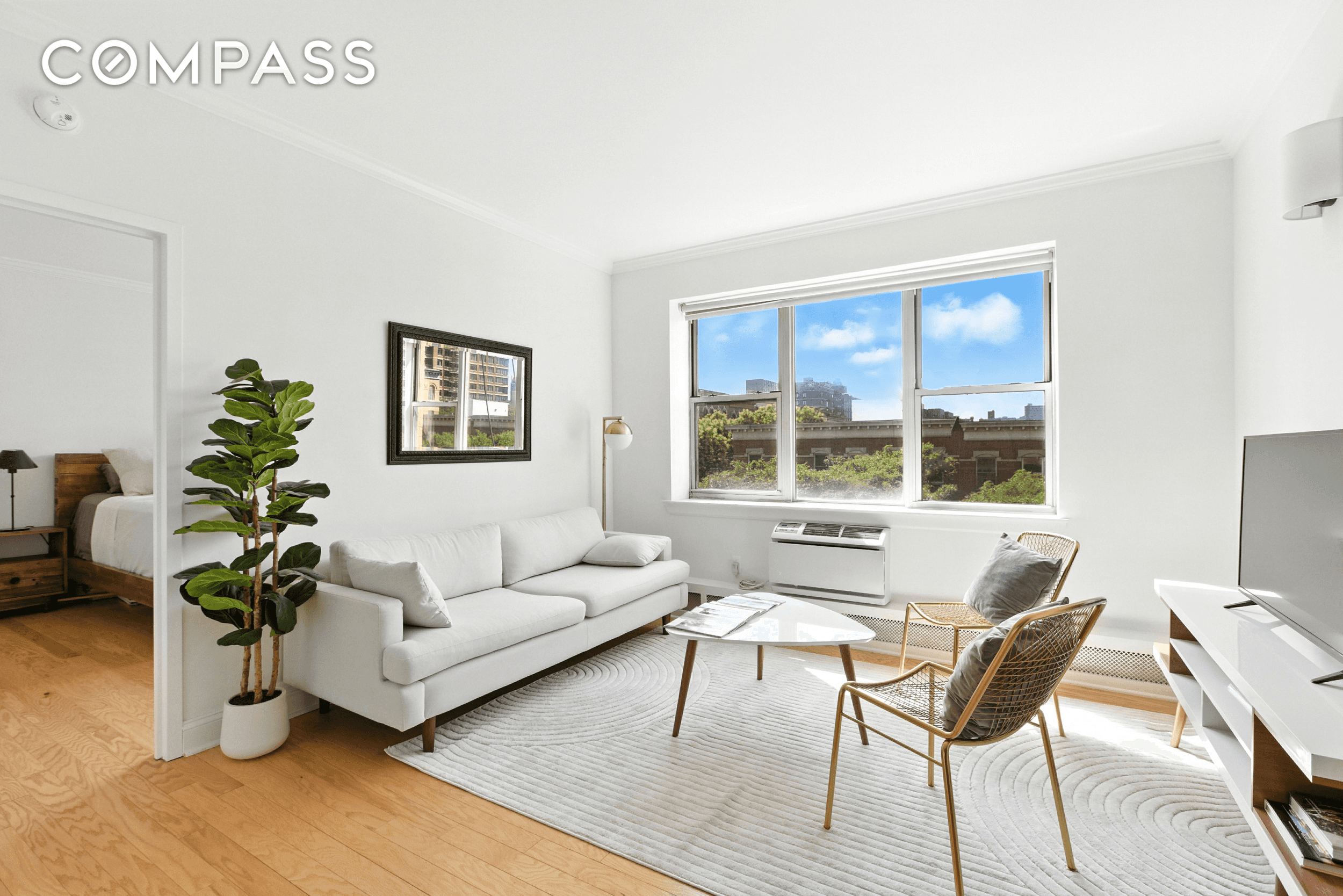 Welcome to this beautifully renovated 2 bedroom, 2 bathroom home with open west facing views and incredible natural light throughout the day.