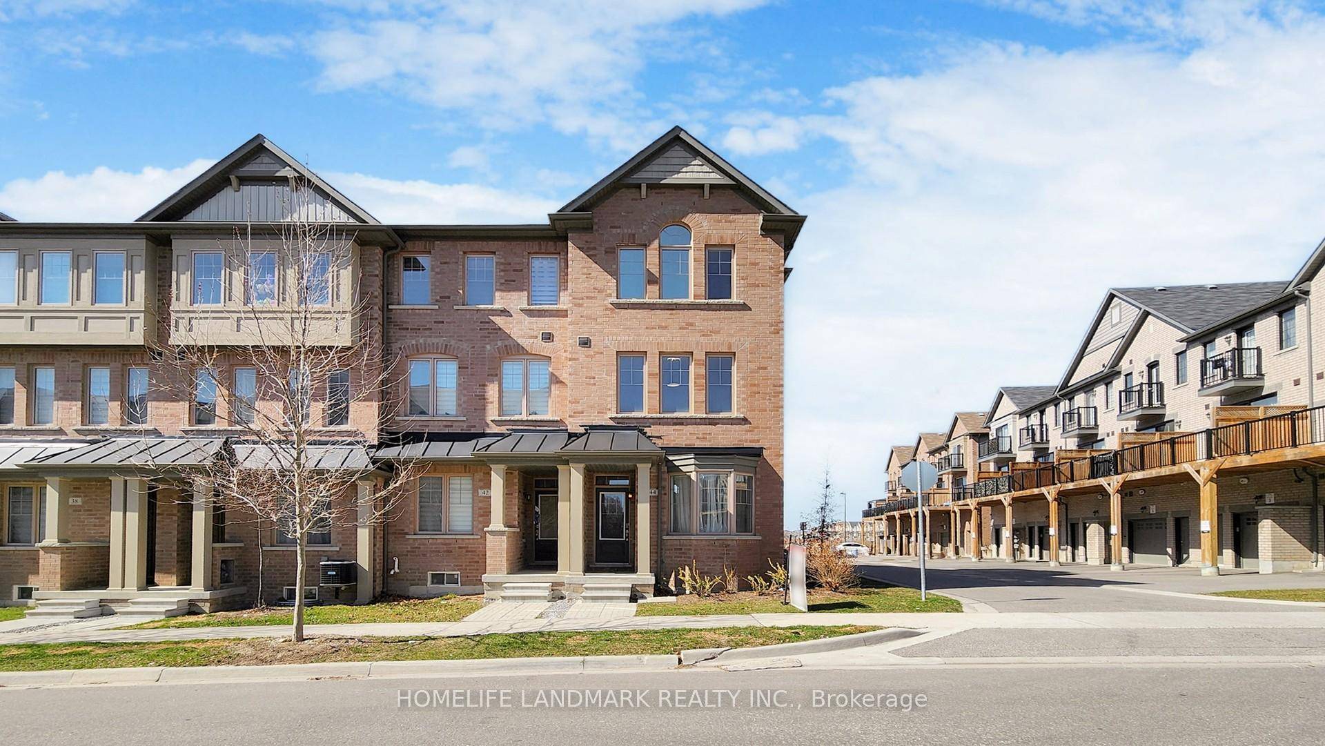 5 Yrs New Freehold Corner Unit Townhome With All Brick Exterior.