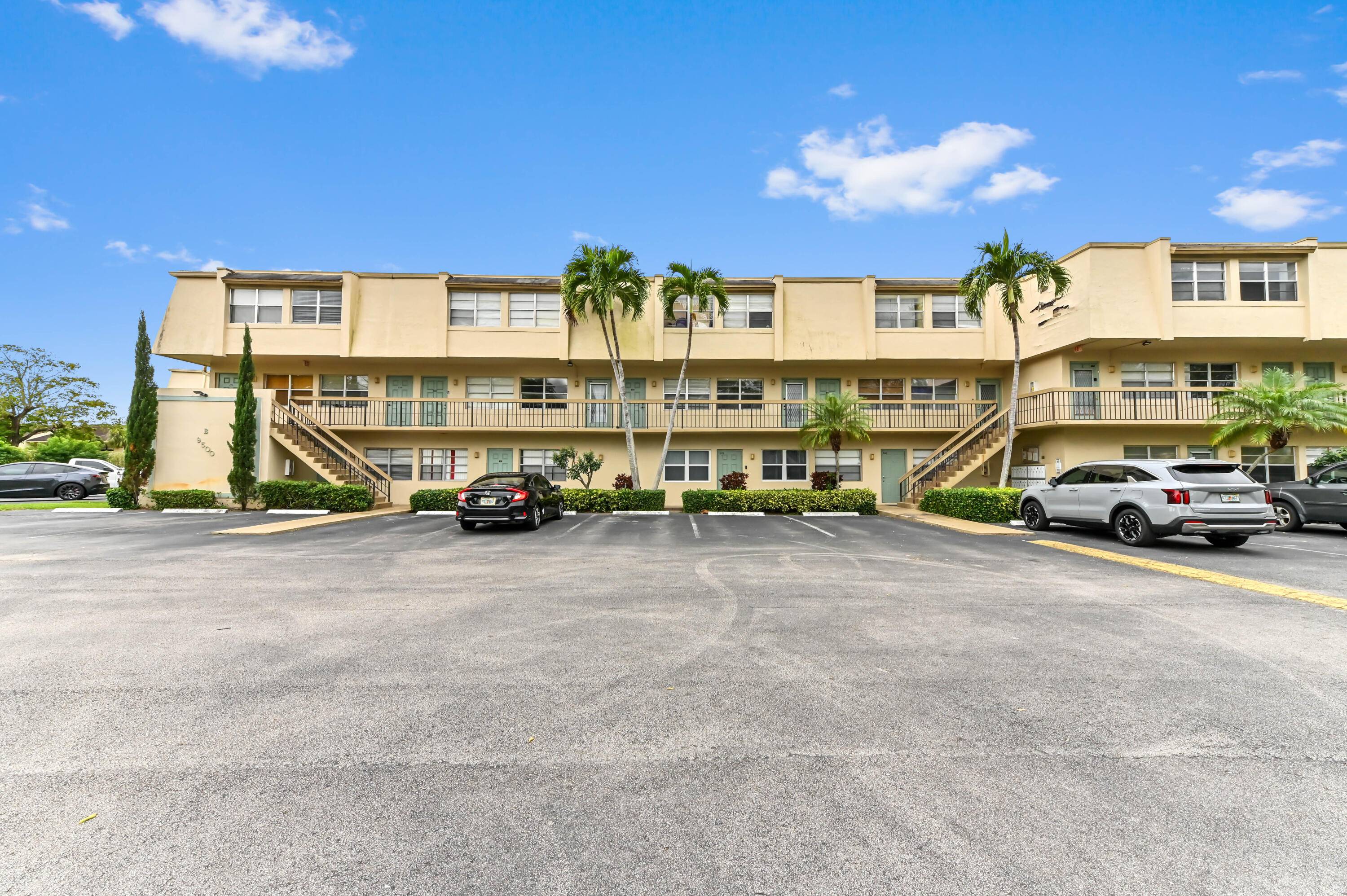 Experience the epitome of luxurious living at 9500 Southwest 3rd Street, an impressively spacious, two story corner townhouse in the highly sought after region of West Boca, Boca Raton, FL.
