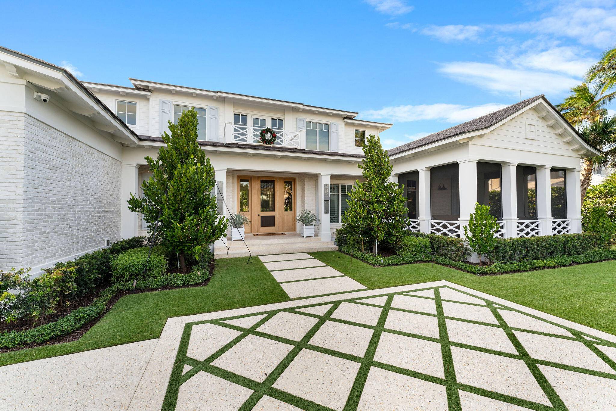 This amazing house overlooks the 15th and 16th fairways.