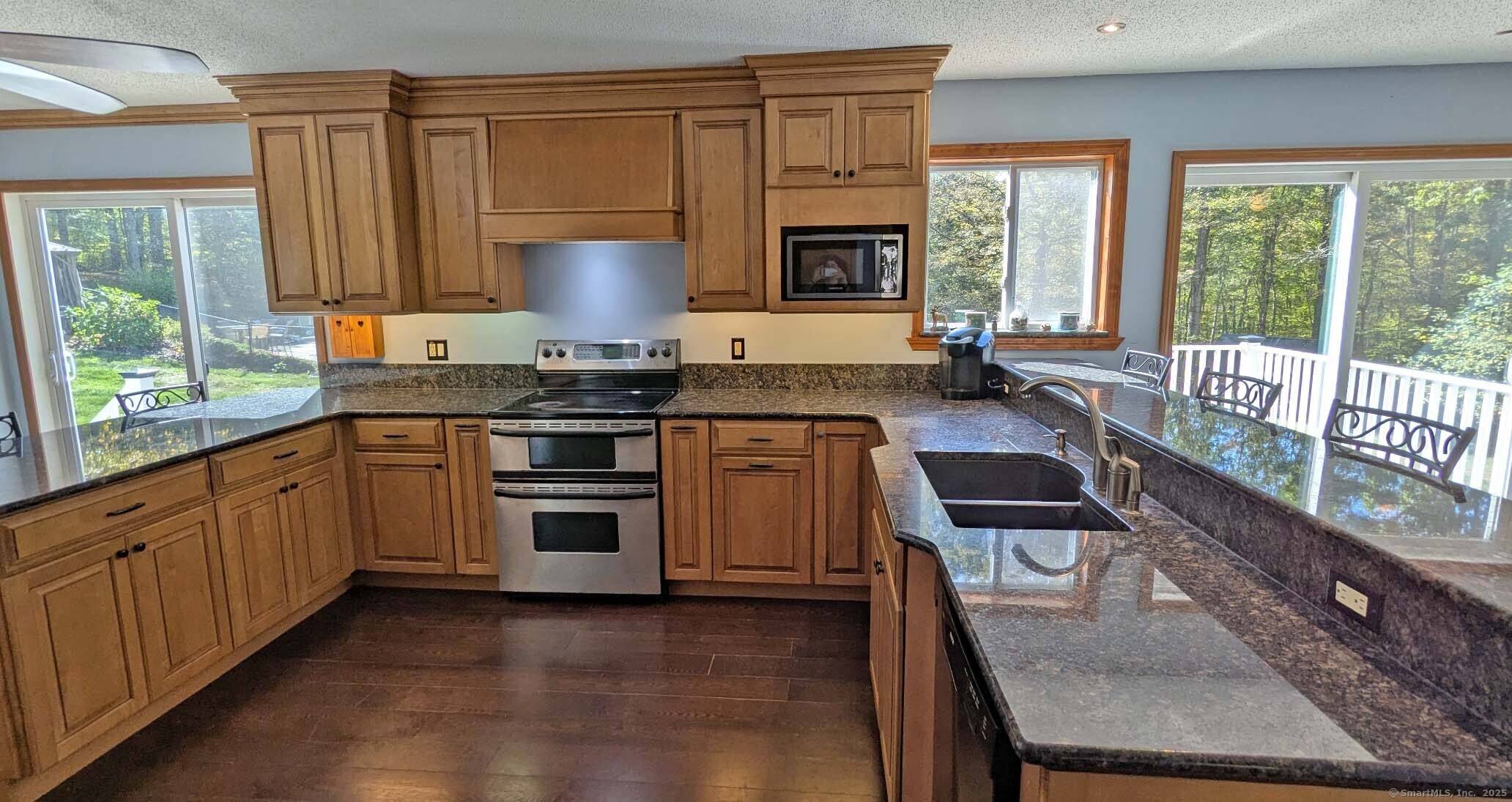 OPEN Saturday October 11th, 10am to Noon If you're looking for privacy and space in a peaceful country setting, this charming Cape Cod home is the perfect fit.