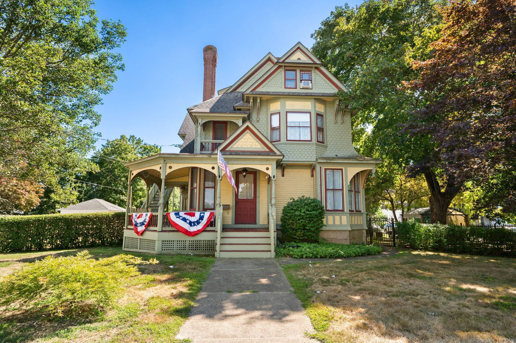 TIMELESS ELEGANCE MEETS MODERN COMFORT in this stunning 1887 Victorian.