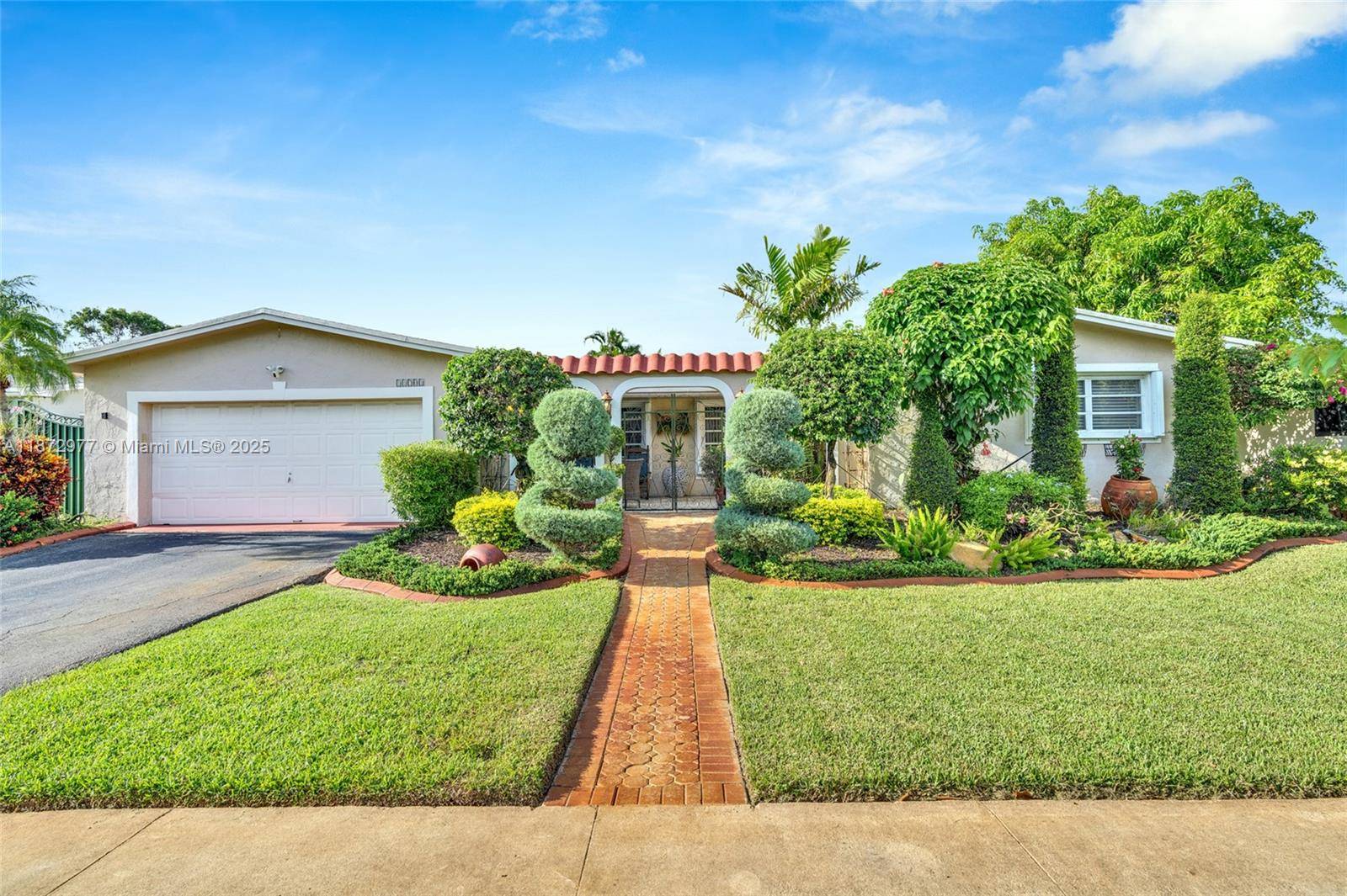 Welcome to your private oasis in the desirable Pembroke Lakes community.