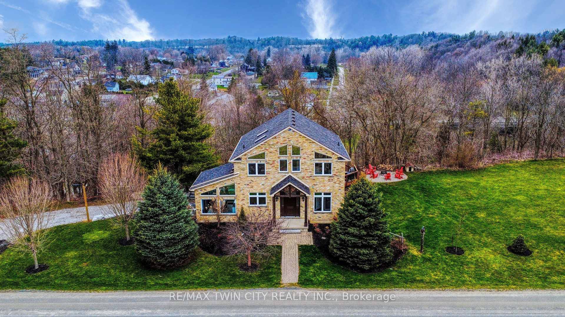 Experience the epitome of luxurious living at 31 Chapel Street, a breathtaking two story Muskoka style home situated in the charming community of Vienna.