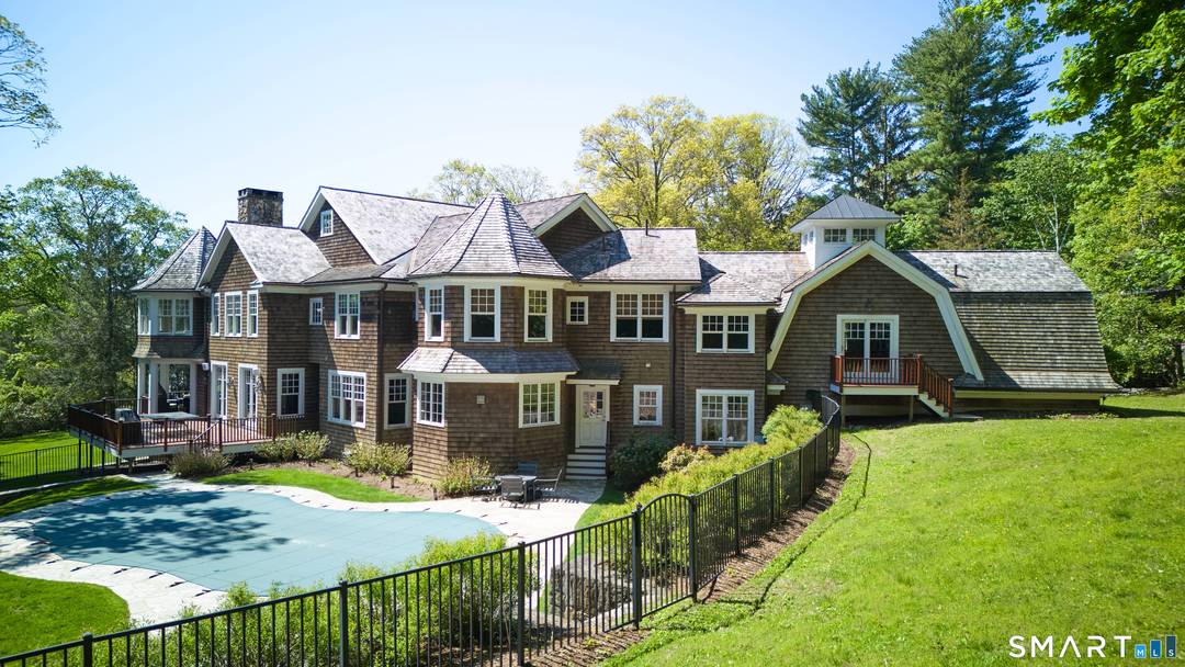 Set in one of Westport's most prestigious estate enclaves, this exceptional shingle style residence defines luxury living with a rare emphasis on multi generational comfort, timeless architecture, and impeccable craftsmanship.