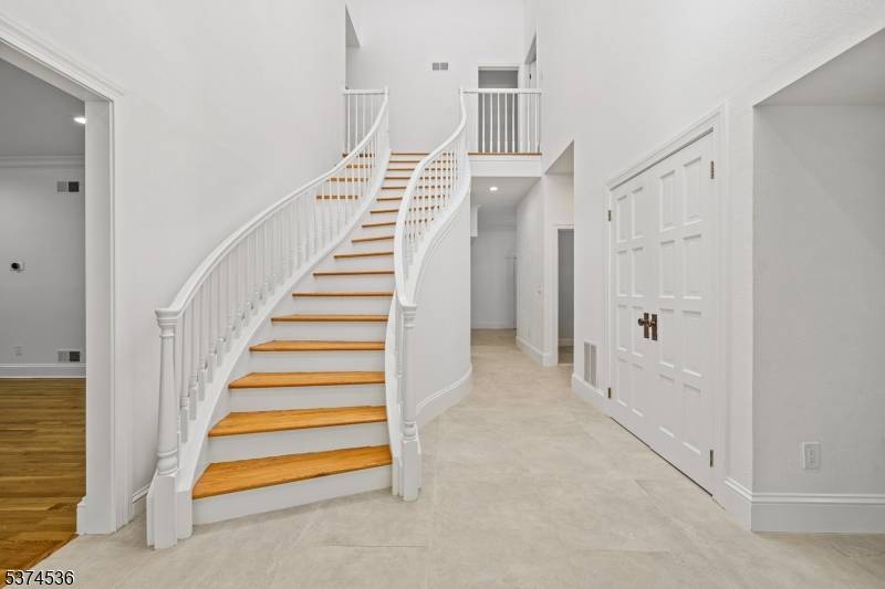Welcome to this impressive and private custom home located on the mountain in Bernardsville.