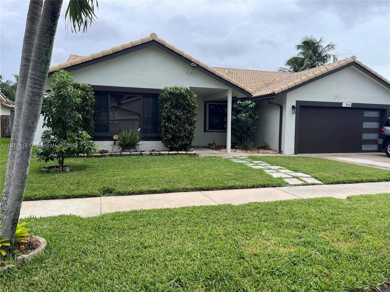 Stunning 4 2 home located in the highly desirable Parkwood Isle subdivision of Davie, FL.