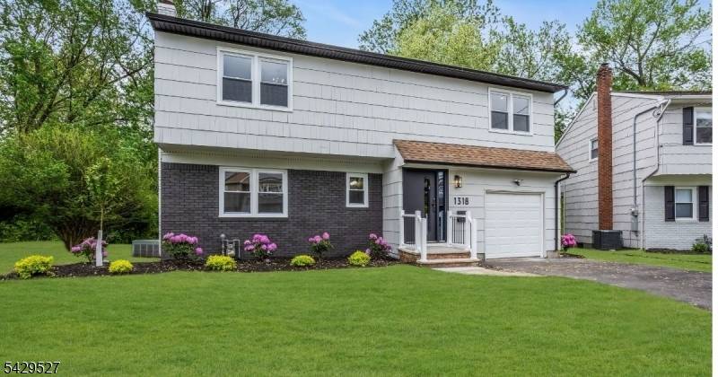 Completely renovated and move in ready, this impressive 4 bedroom, 2 full bath bi level home offers modern design, functional living space, and a peaceful natural backdrop.