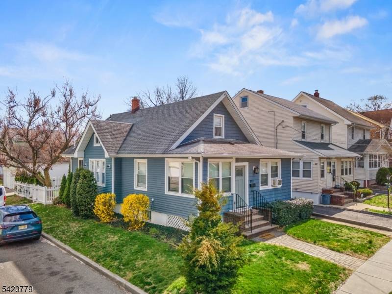 Welcome to this beautifully maintained two family home in the highly desirable Lakeview section of Clifton !