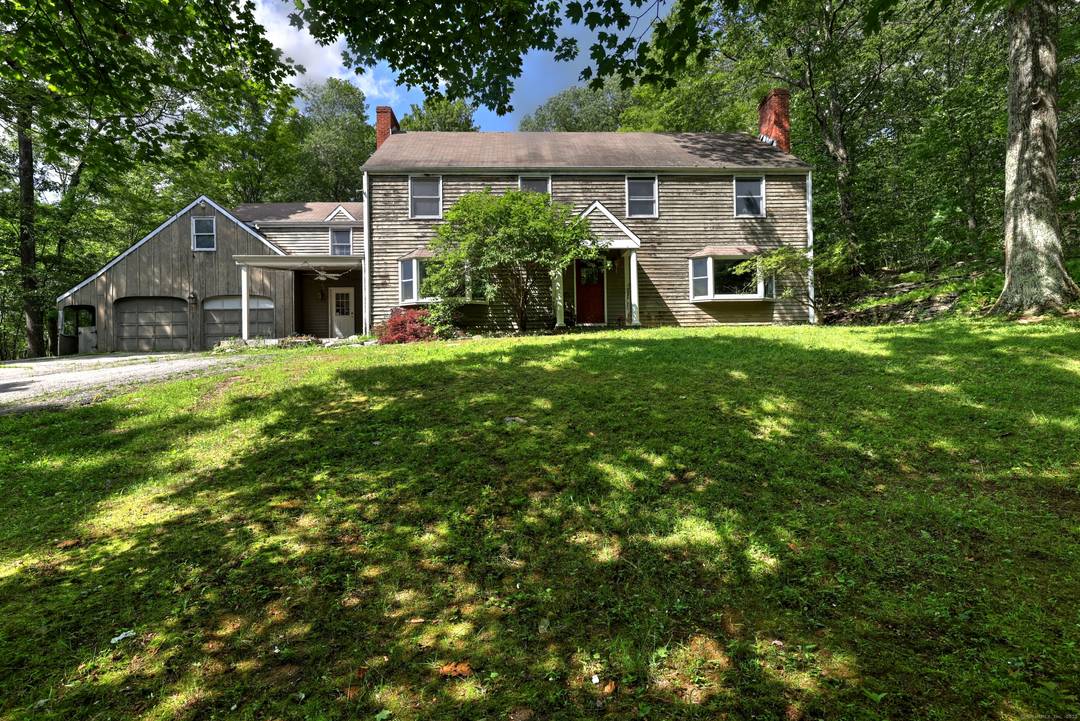 Meander up the curved driveway to your secluded 6.