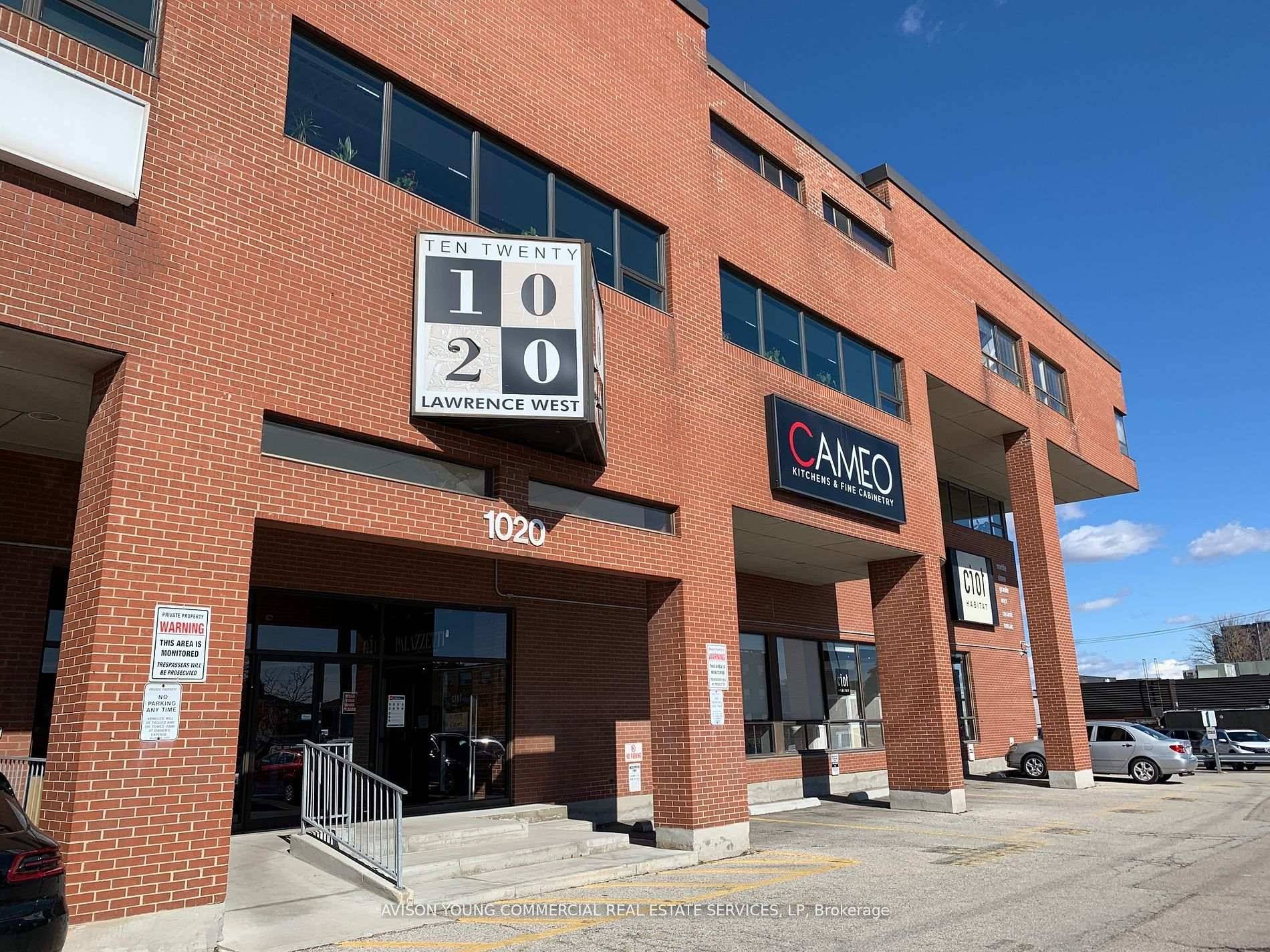 Turnkey office suite with private kitchenette, natural light and 2 dedicated parking spots.