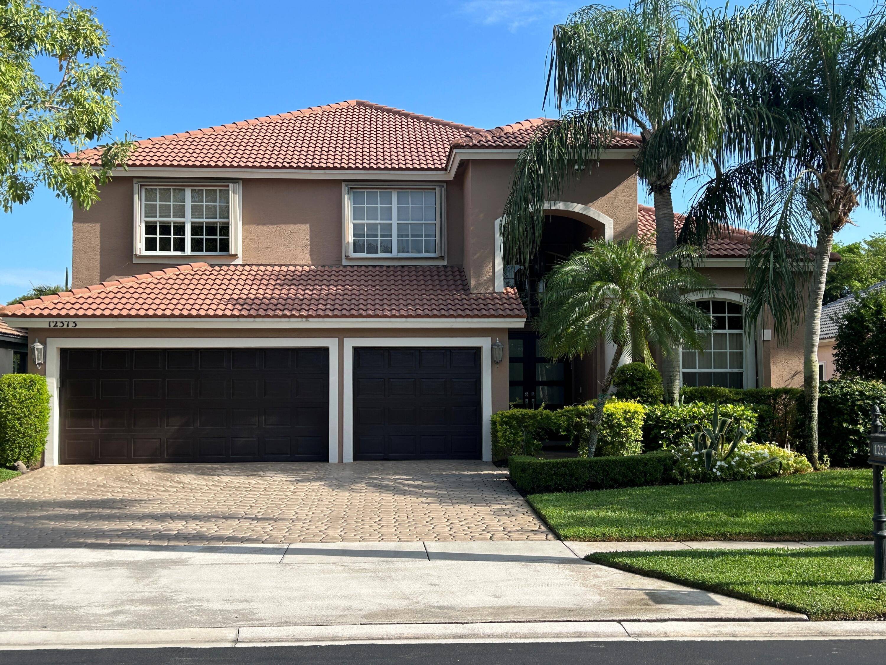 PRICED TO SELL ! Amazing 5 bedroom with loft, 3 full bathrooms, 3 car garage home with pool and gorgeous lake views in most desirable Boca Falls.