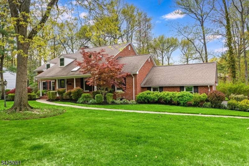 Impeccably updated, surprisingly spacious colonial on over half an acre in the highly sought after Baltusrol Top neighborhood.