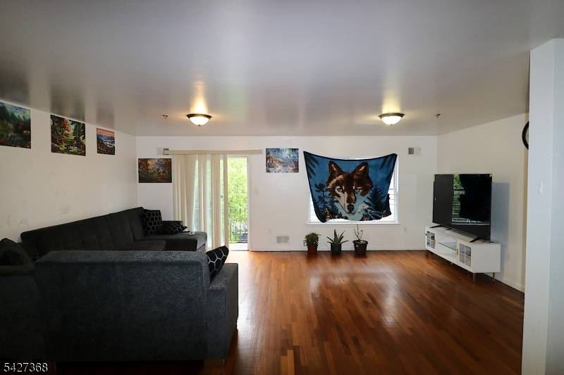 Welcome to this exceptional, well maintained three family home located in the highly desirable Upper Clinton Hill section of Newark.