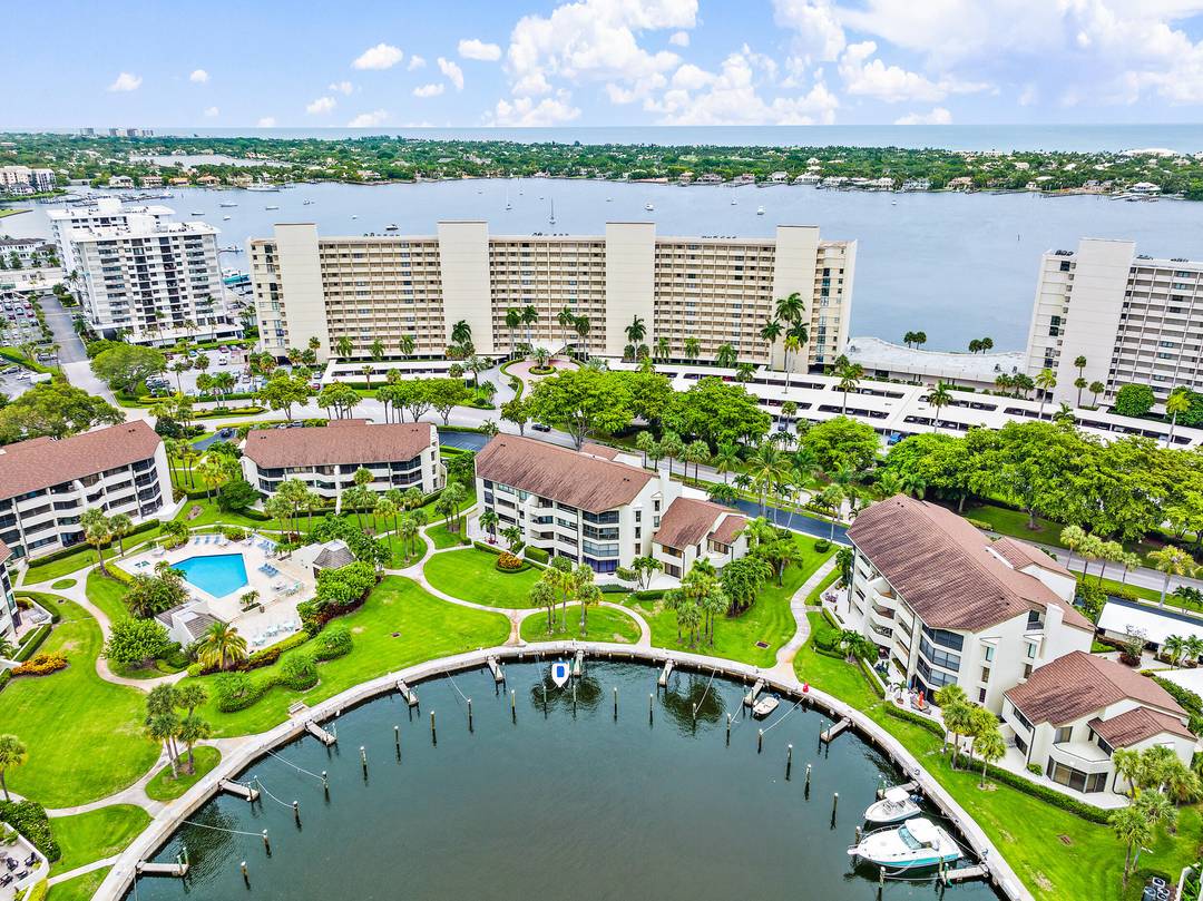 GORGEOUS WATERFRONT condo within the gated community of Old Port Cove.