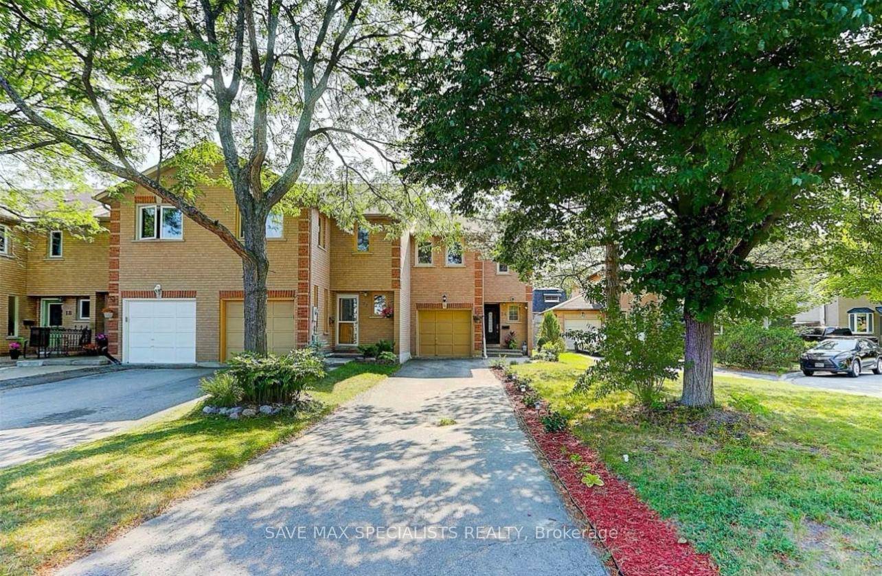Newly Renovated Spacious Townhome in North Aurora, featuring Laminated Floors through out, Quartz Counter, Upgraded Light fixtures.