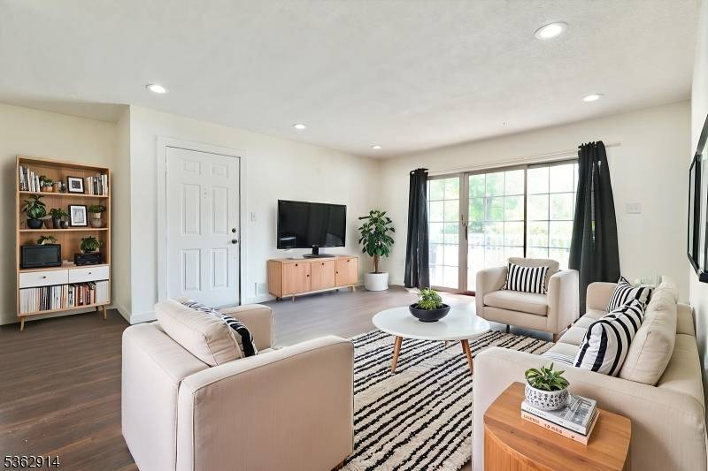 This updated 2bed 2bath ground level condo, where modern convenience meets cozy charm.