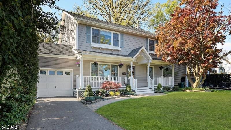 Exceptional style, privacy, and setting define this beautifully updated Colonial in Cranford's sought after Indian Village.