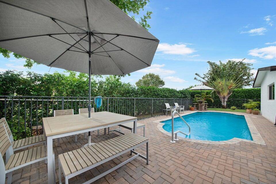 ALSO AVAILABLE FOR SEASONAL RENTAL Welcome to this exceptional furnished home in the sought after active adult community of Coco Wood Lakes a true tropical paradise.