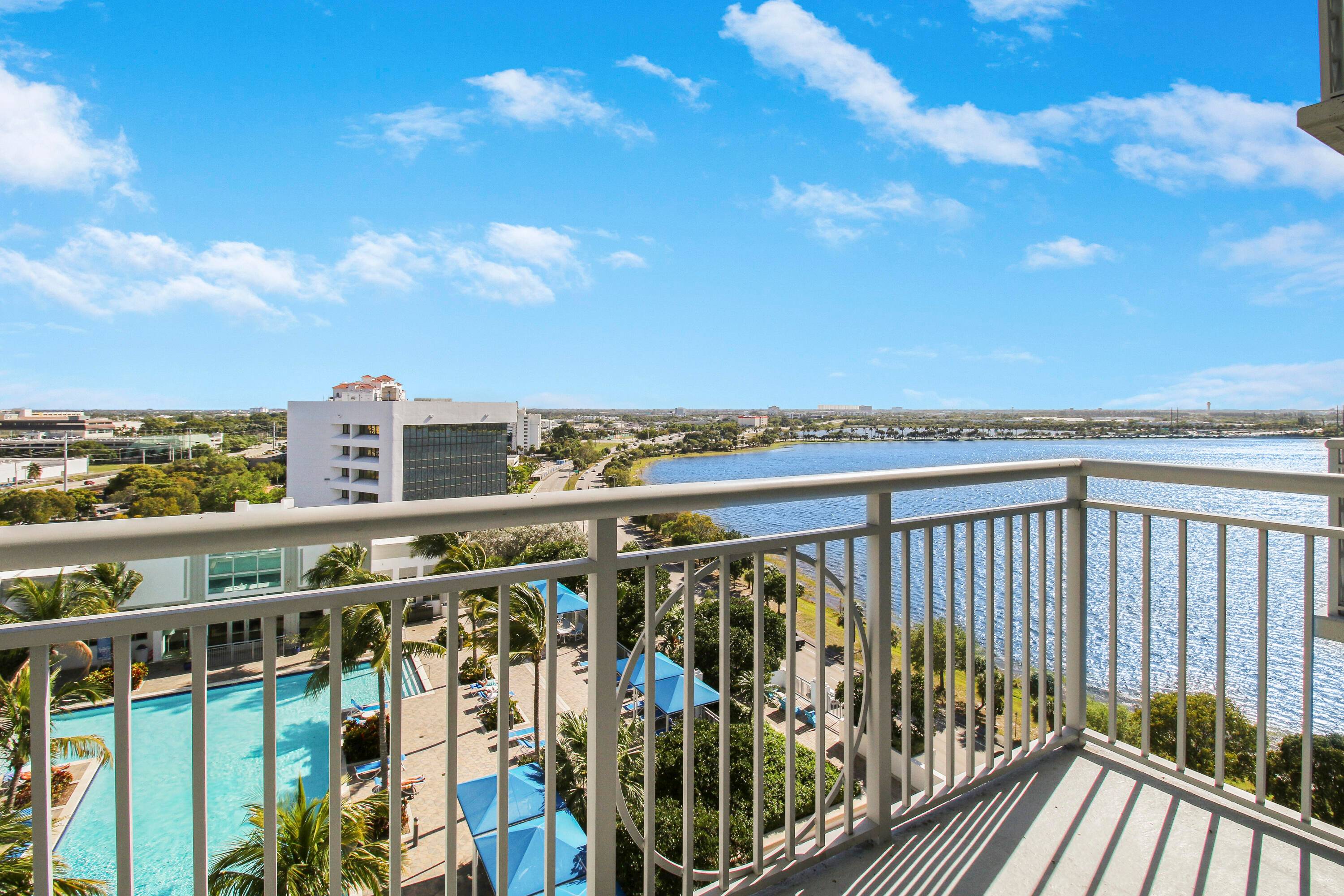 Stunning 11th Floor Condo with Water, City Pool Views !