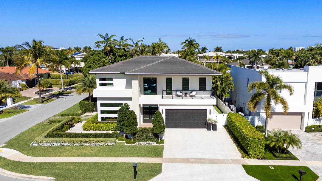 Experience refined luxury in this exceptional custom new construction residence located in the heart of downtown Boca Raton.