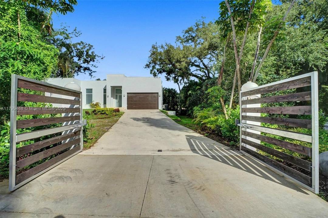 Escape the everyday in this stunning, contemporary retreat a 2021 built and newly renovated 5 bedroom, 3 bath home tucked away on a quiet cul de sac just minutes from ...