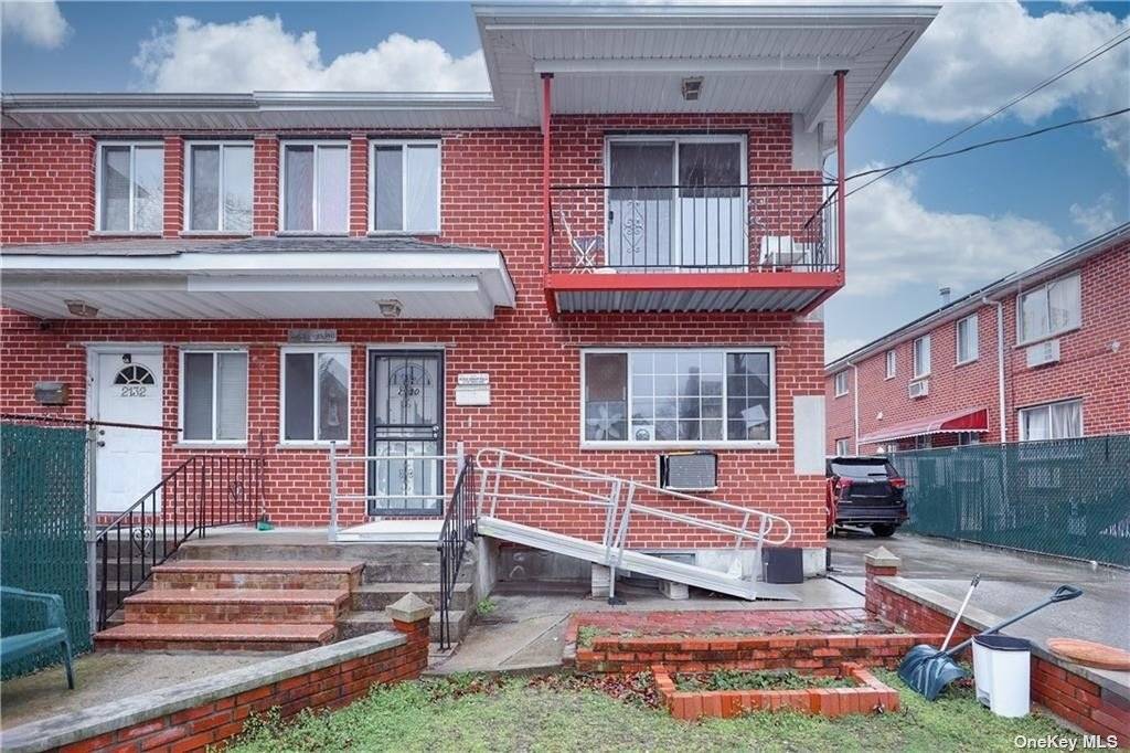 Amazing huge 2 family brick home in Flatlands ; this semi detached property boasts two spacious stories over a full and finished basement, offering comfortable living space for residents.