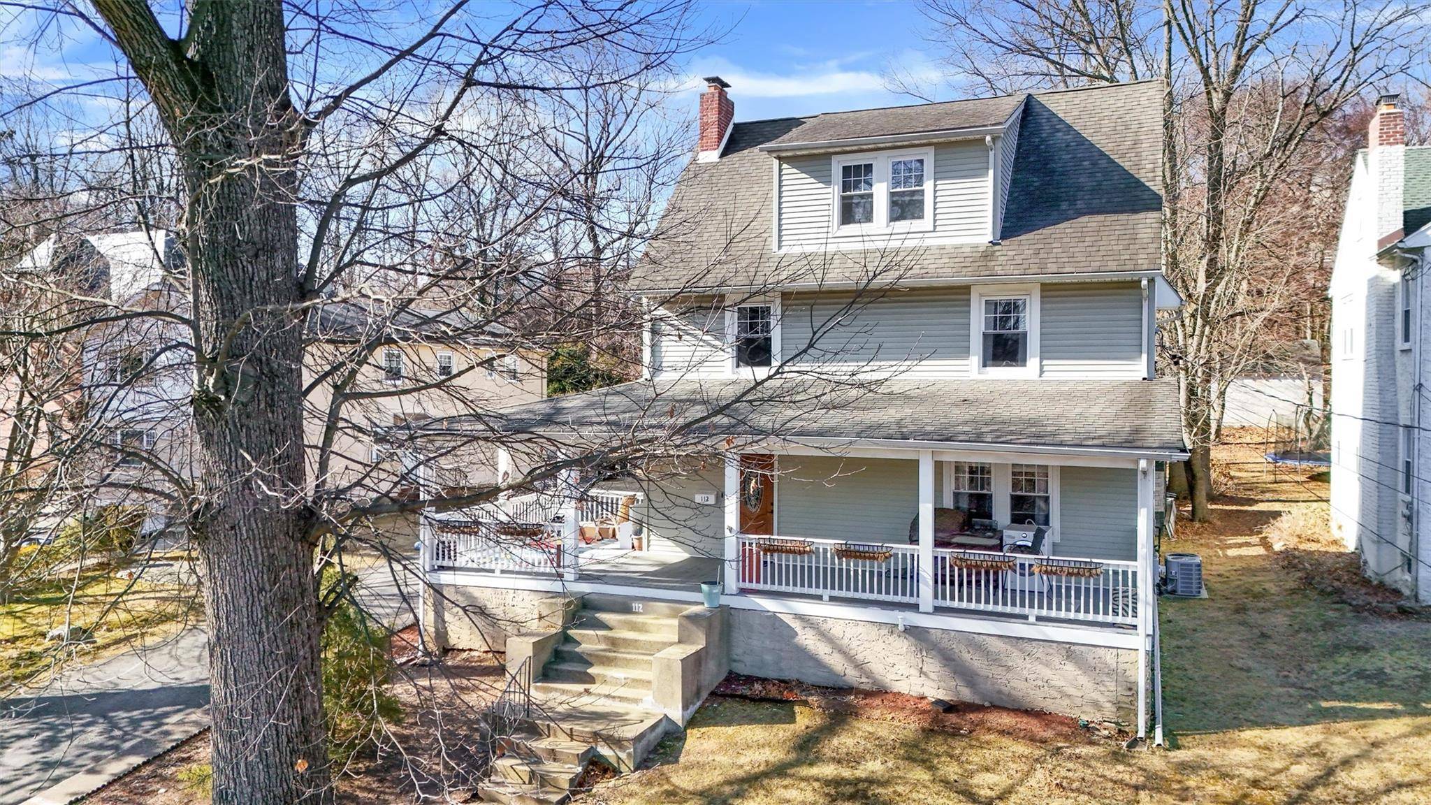 The hallmarks of this vintage home include a welcoming rocking chair porch and an amazing private yard with plenty of room to roam on.