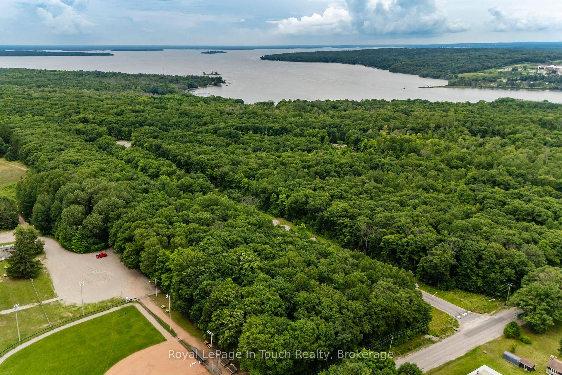 Build your dream home here on this mature lot in the beautiful Toanche Settlement area of Tiny Township.