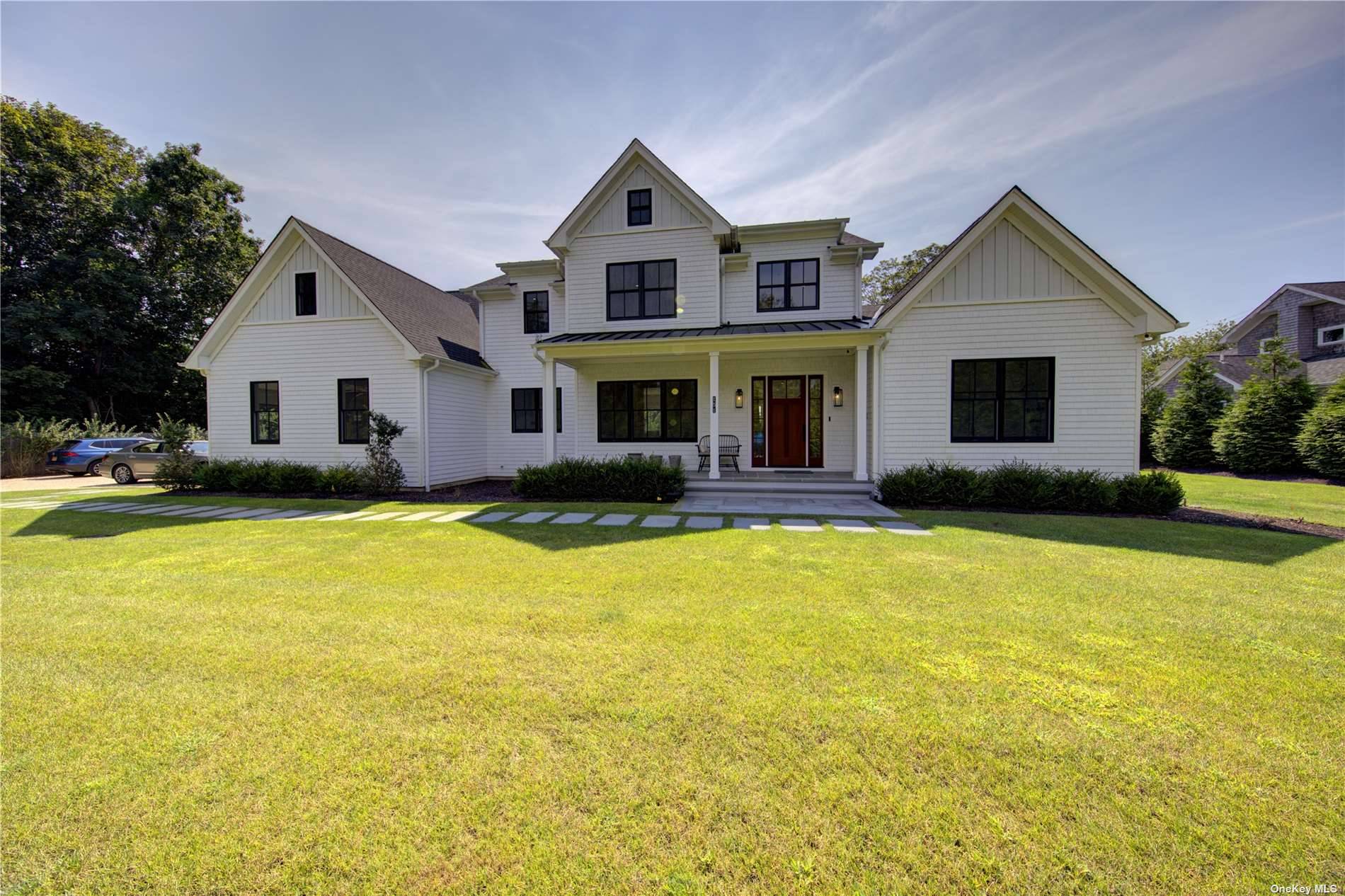 This newly constructed modern home offers the epitome of comfort and elegance, featuring 5 bedrooms and 7.