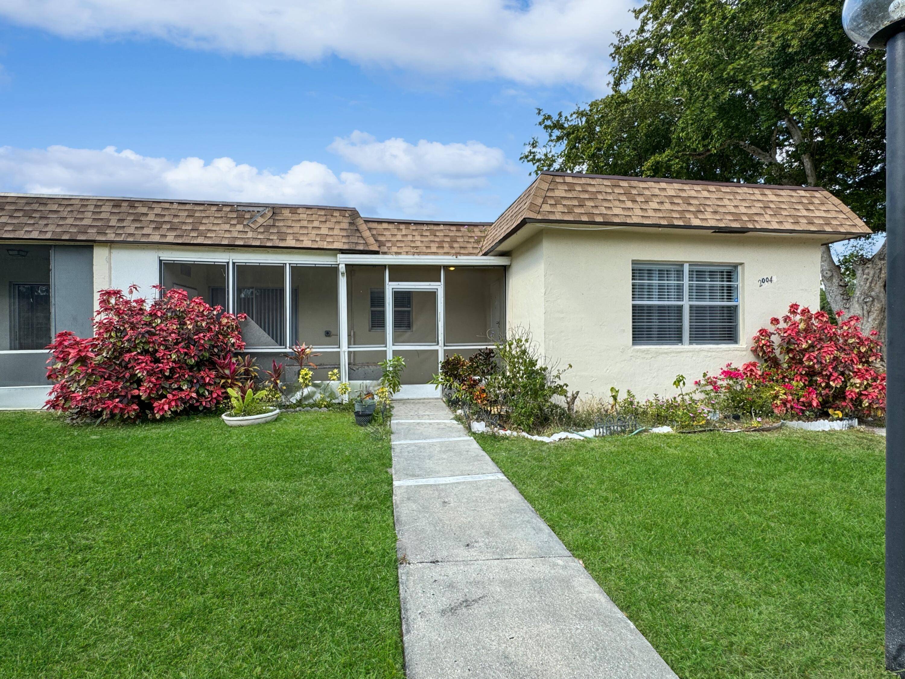 Welcome to this charming 2 bedroom, 2 bathroom villa located in peaceful 55 community of Natura in Deerfield Beach.