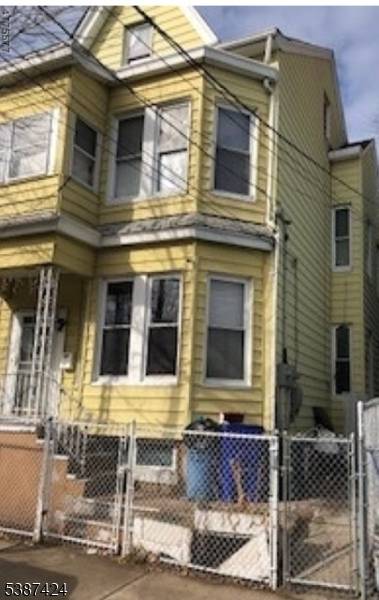 large 2 family with finished attic and finished basement.