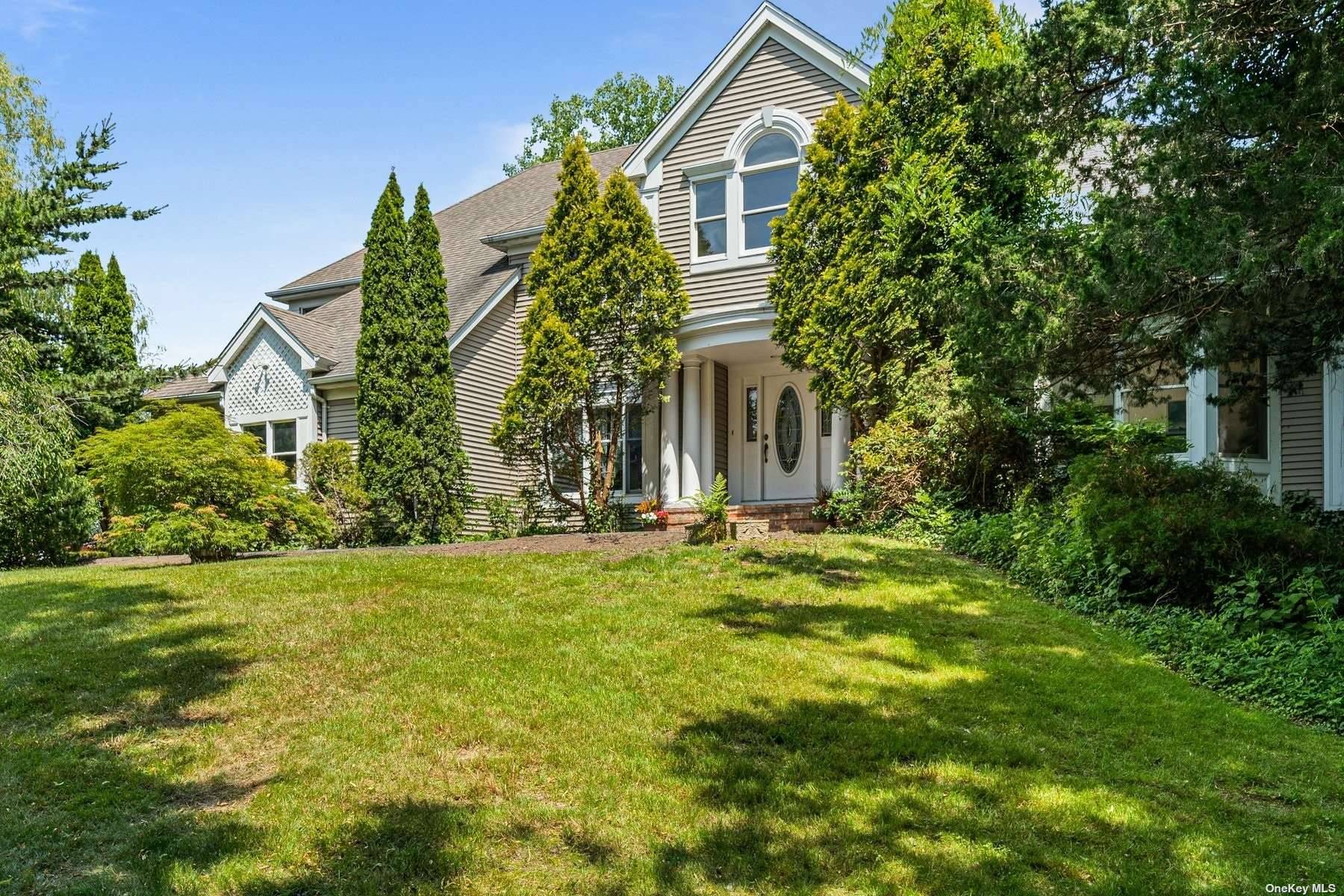 Nestled within an idyllic neighborhood, this stunning diamond colonial home exudes elegance and charm.
