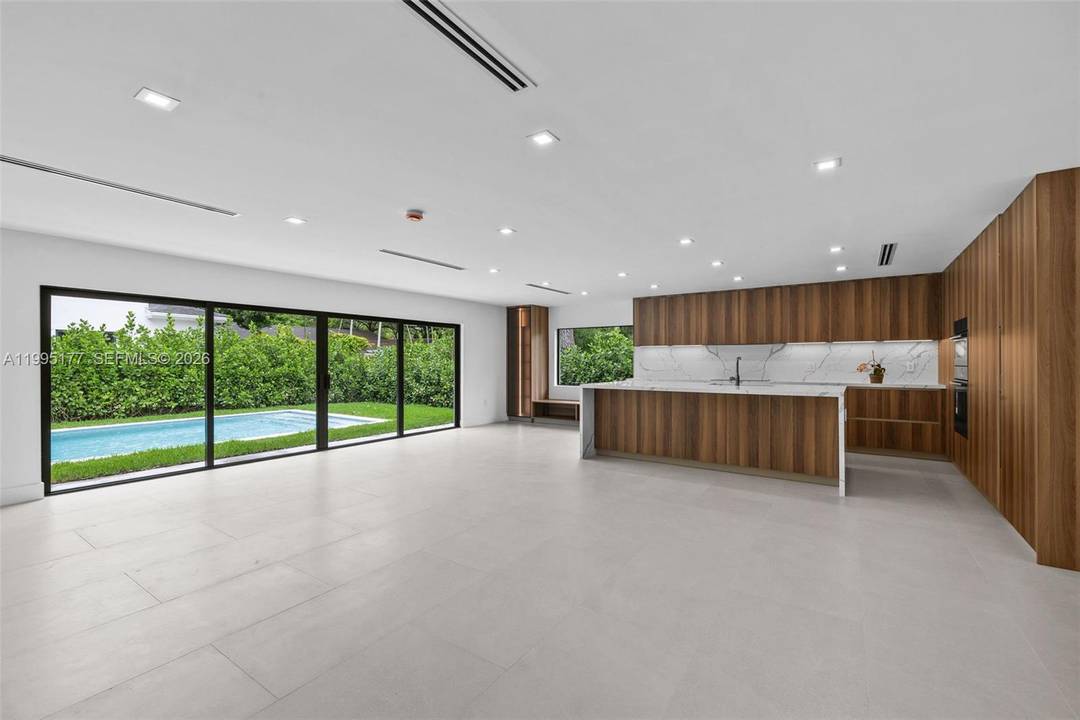 Immaculate, 2026 new expansion and rebuilt custom 3, 360 sft home w incredible upgrades and workmanship on a quiet South Miami street east of US1.