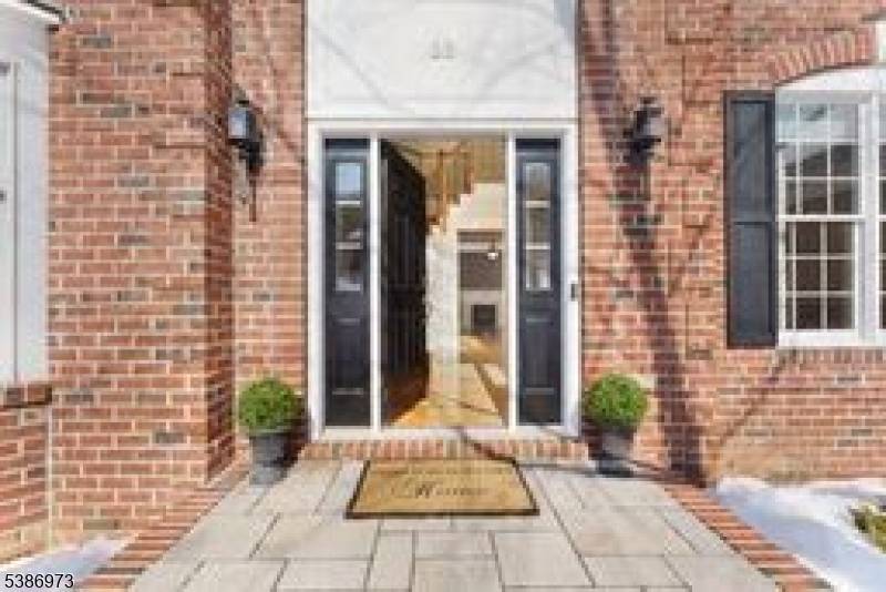 Experience unparalleled luxury in this exquisite Colonial in the prestigious Estates at Long Valley w serene views overlooking the Black Oak Golf Course.