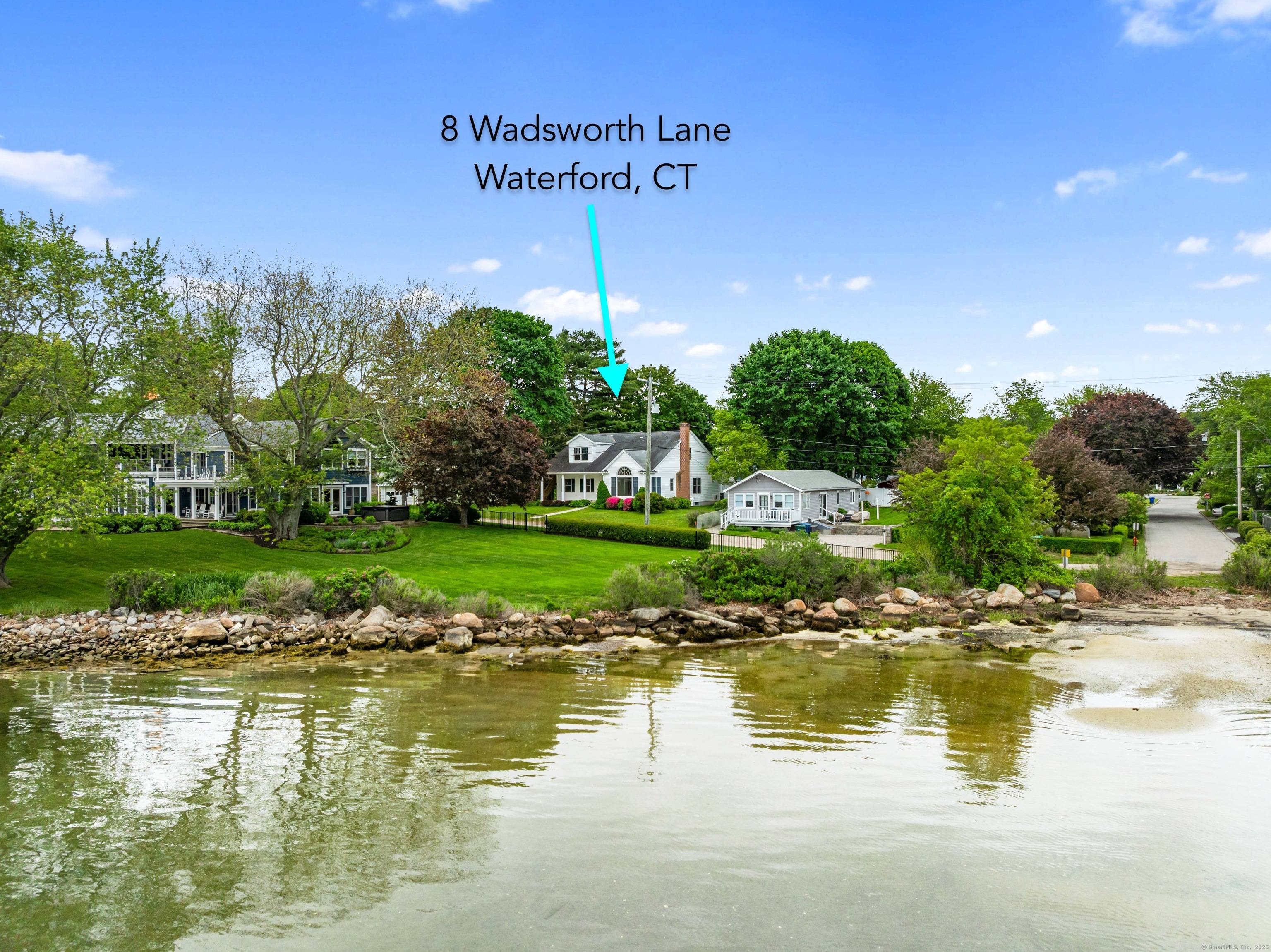 Beautiful one owner custom built home in ready to move in pristine condition, located in Mago Point, Waterford, CT, looking up the Niantic River.