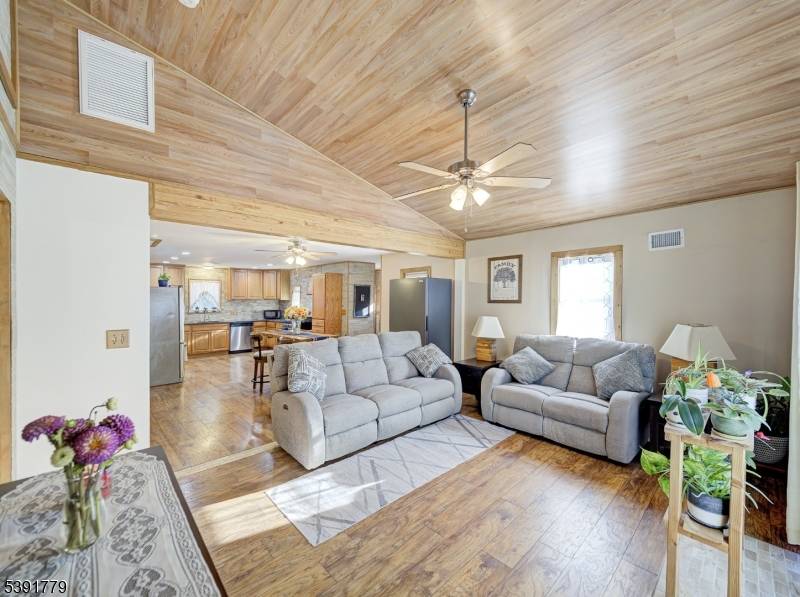 Step through the front door into a bright, open space that instantly feels like home.
