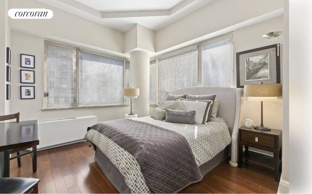 Residence 6K at 350 West 50th Street is an extraordinary loft like sunny corner, mint renovated studio with soaring high ceilings, eight over sized window panels facing East and South, ...