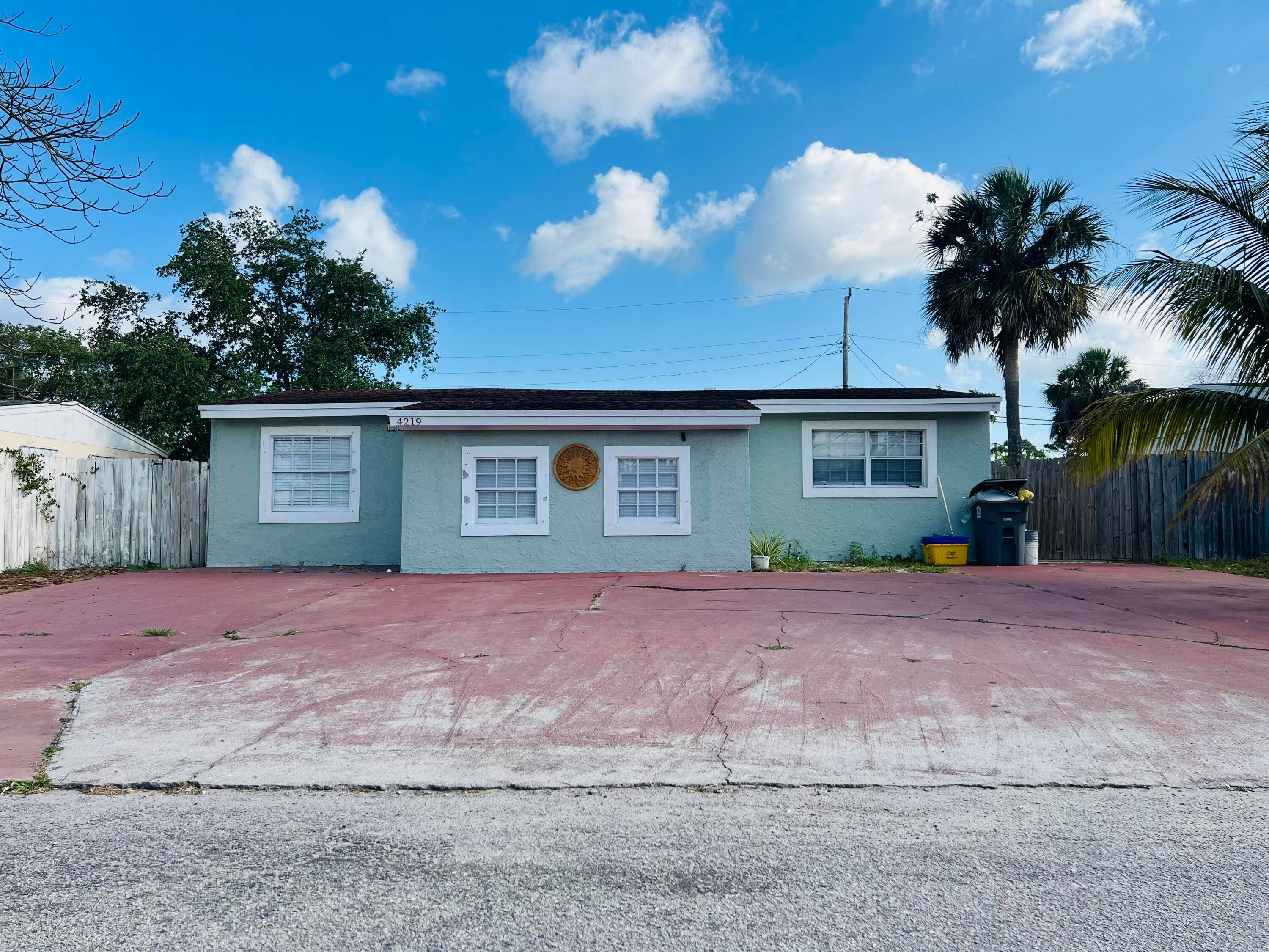 This charming 3 bedroom, 1 bathroom home is located at 4219 N Browning Drive N, in the peaceful community of Gun Club Estates in West Palm Beach, FL.