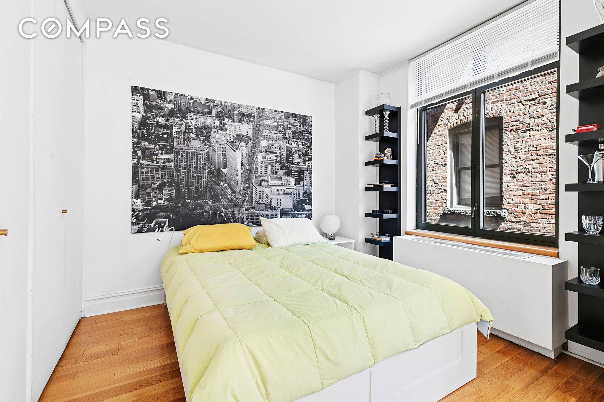 Furnished alcove studio with washer and dryer in top Riverside Drive Condominium.