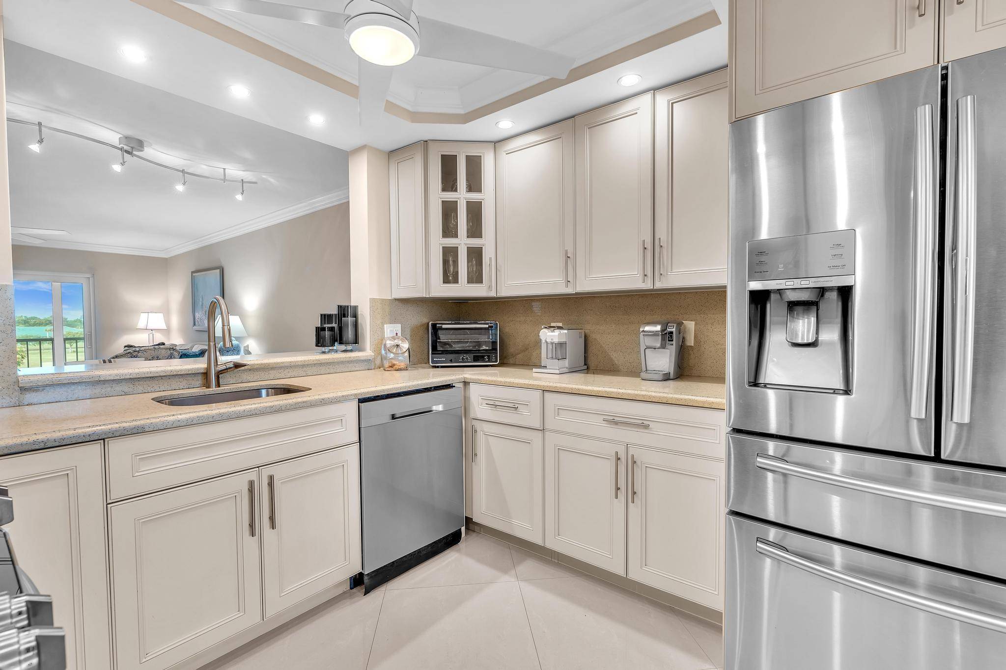 One of a kind, turnkey 2 bed 2 bath END UNIT condo in the highly sought after Huntington Lakes !