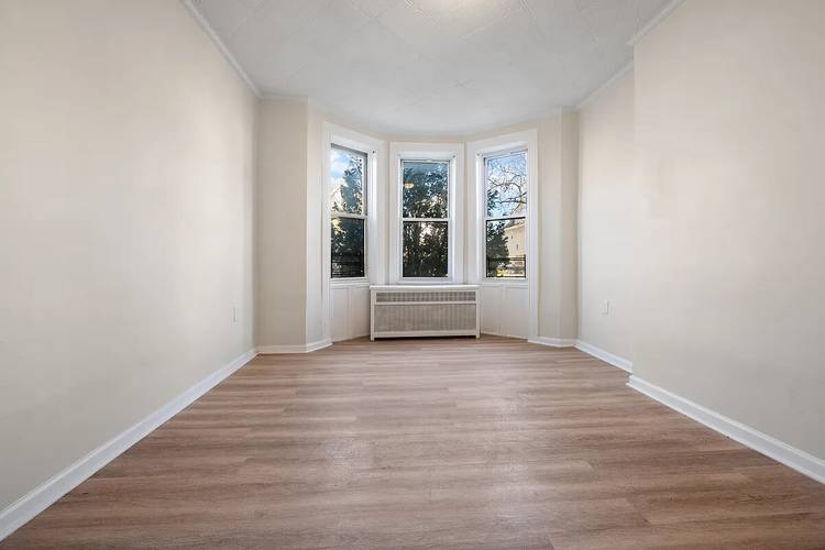Spacious, newly renovated 2 bedroom with private outdoor space in the heart of Kensington.