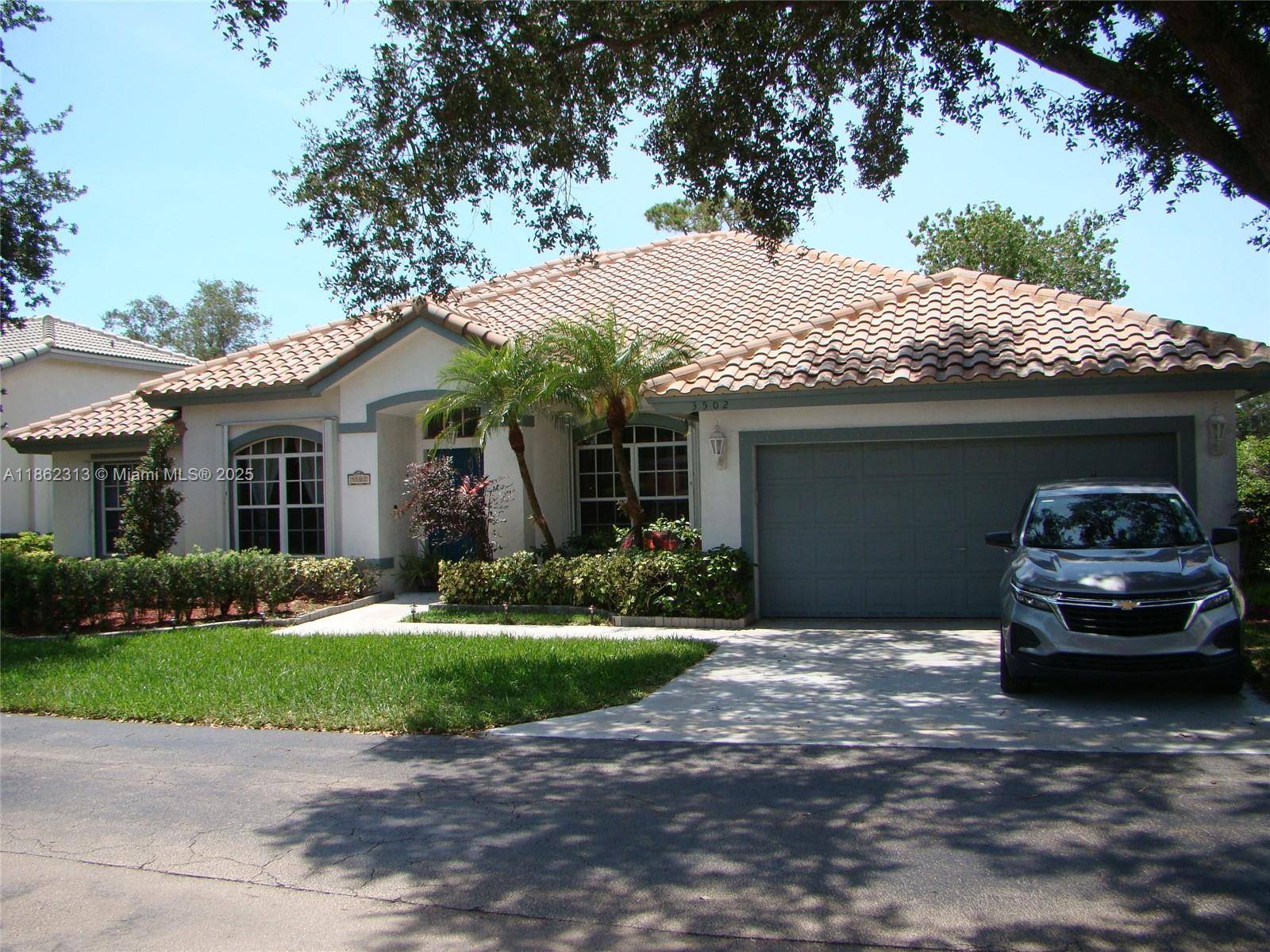 Welcome to your dream home in the prestigious Oasis Estate in Pompano Beach.