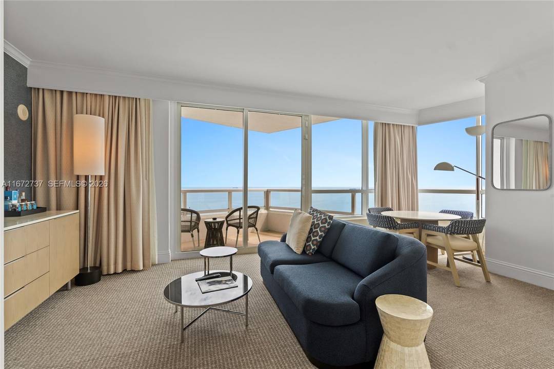 Rarely available, this 2BD 3BA unit at Fontainebleau II offers stunning, unobstructed views of the ocean, bay, and city.