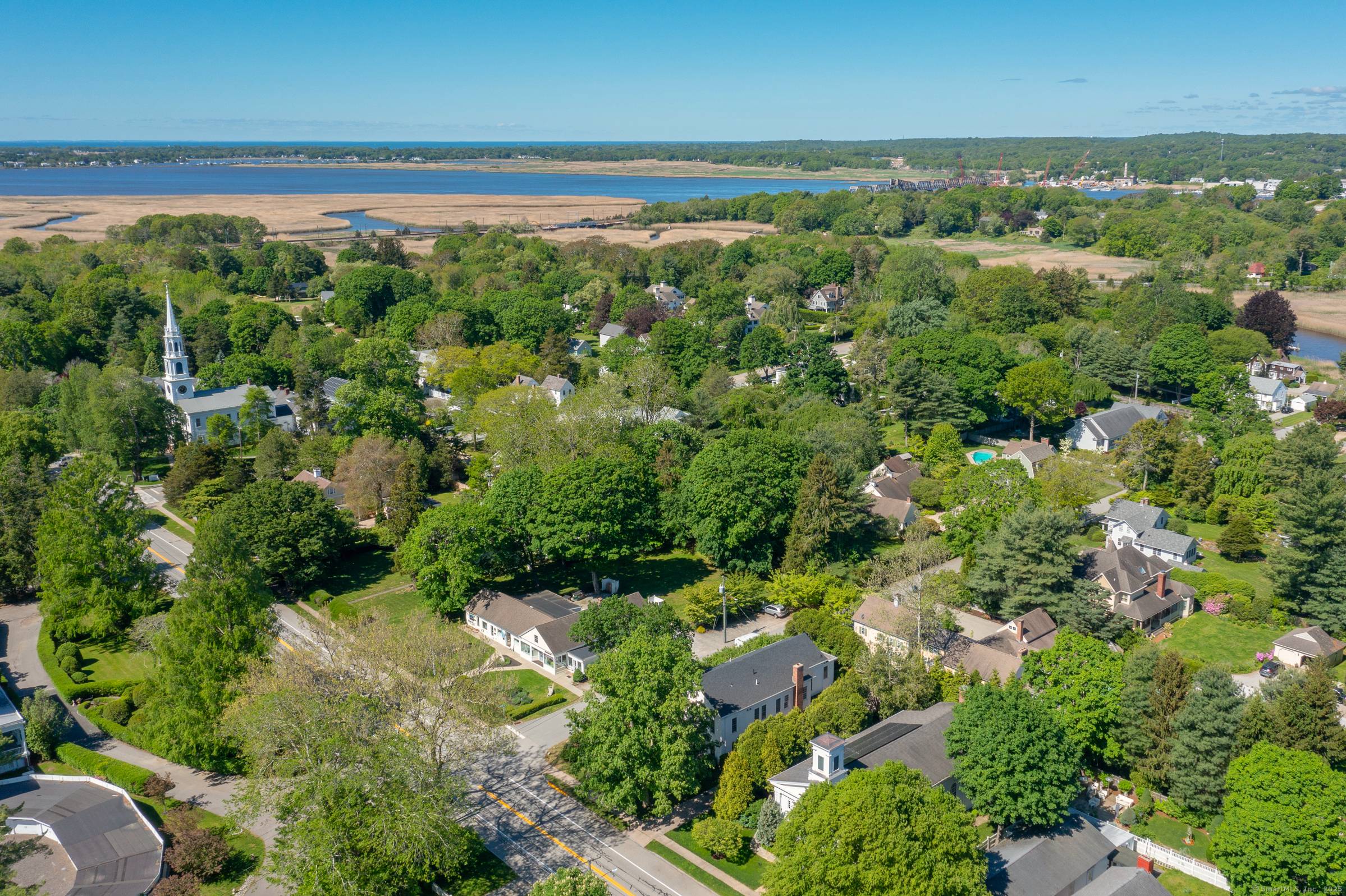 A handsome pristine C1850 4 Bed 3 Bath residence on much revered Lyme St, in the historic village district of Old Lyme.