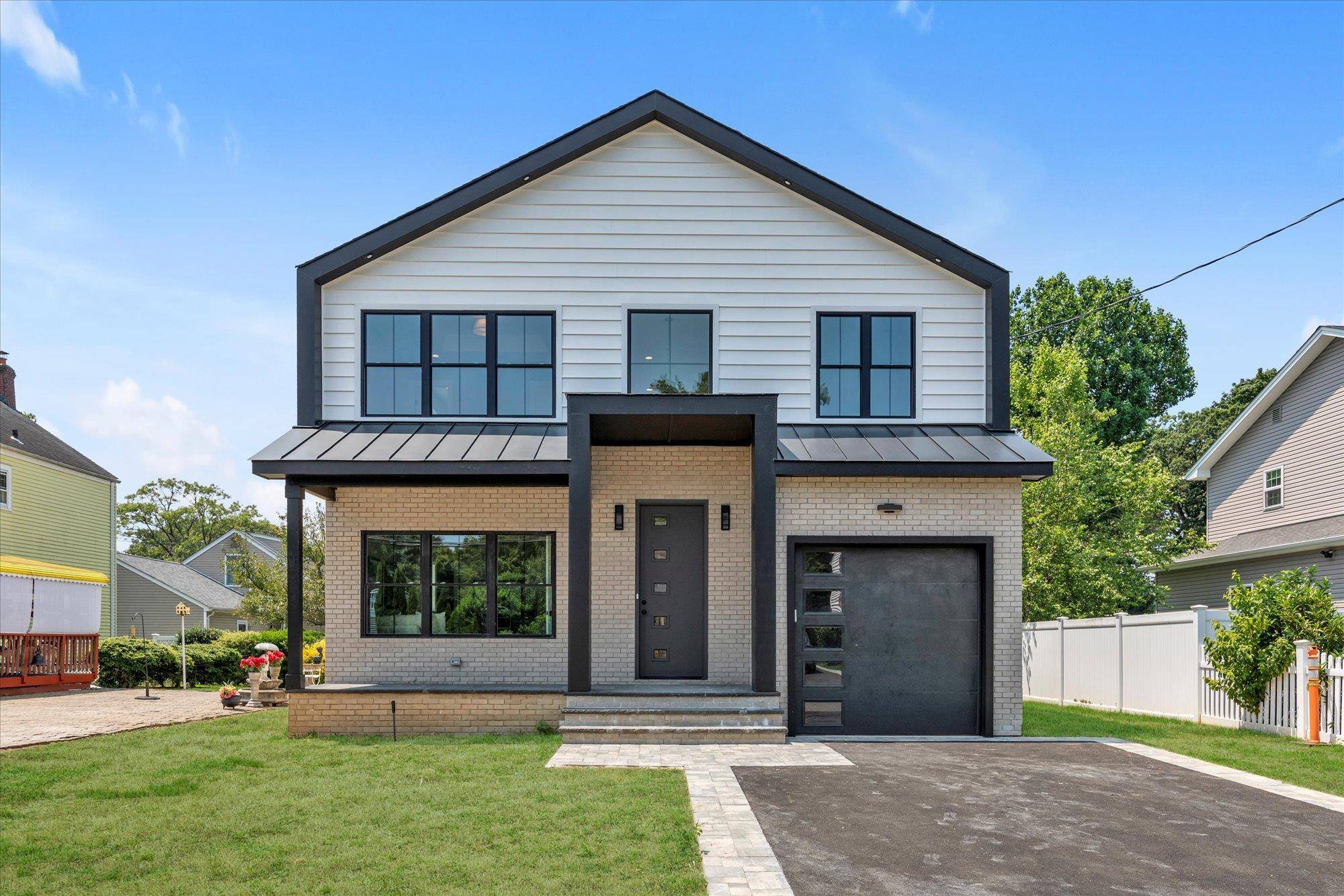 Move In Ready ! Discover this new construction home in desirable North Syosset, offering over 3, 400 square feet of thoughtfully designed living space.