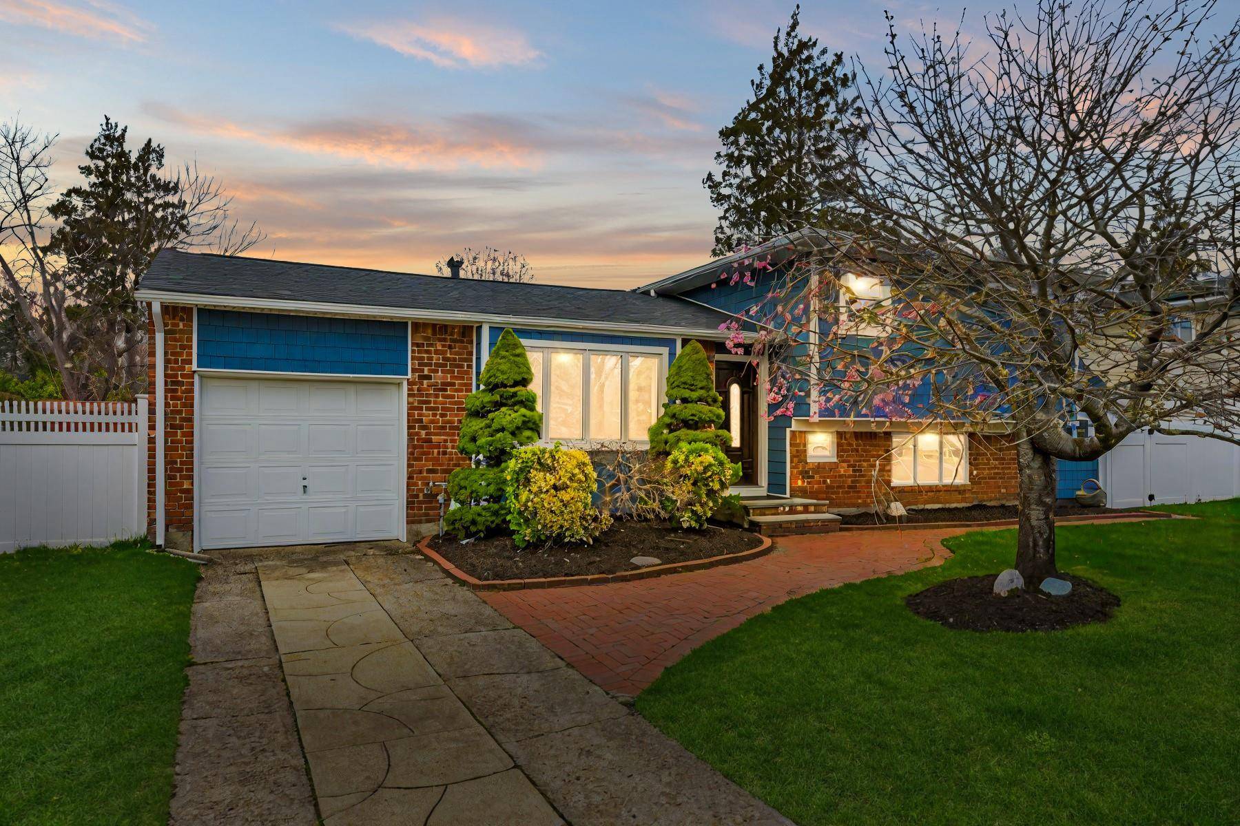 Step into this meticulously renovated split level home, offering 4 bedrooms and 2 full bathrooms, all thoughtfully designed for today s lifestyle.