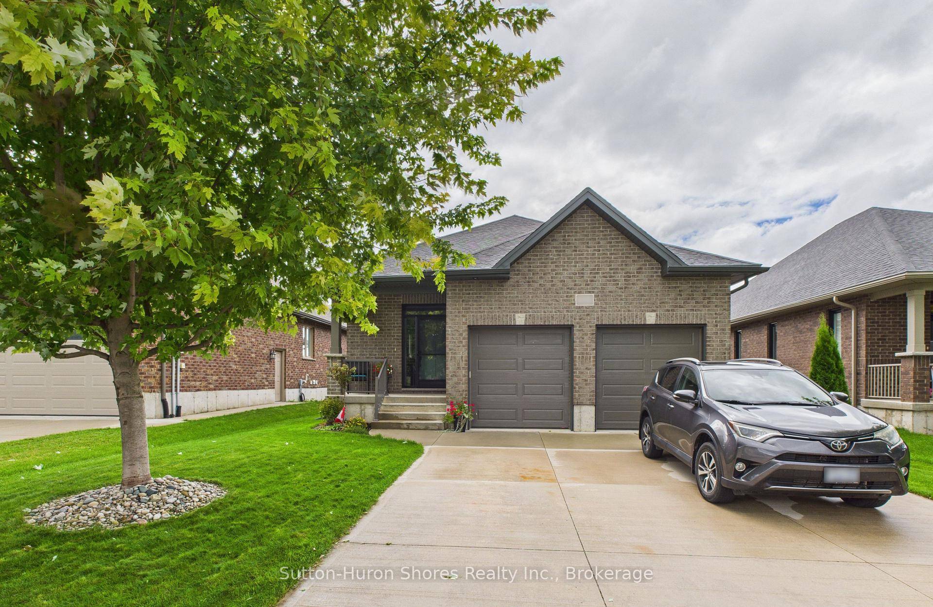 This solid brick Walker Home, built in 2018, offers 1, 417 sq.
